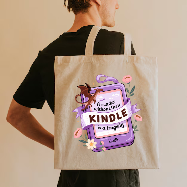 A Reader Without Their Kindle Is A Tragedy Tote Bag